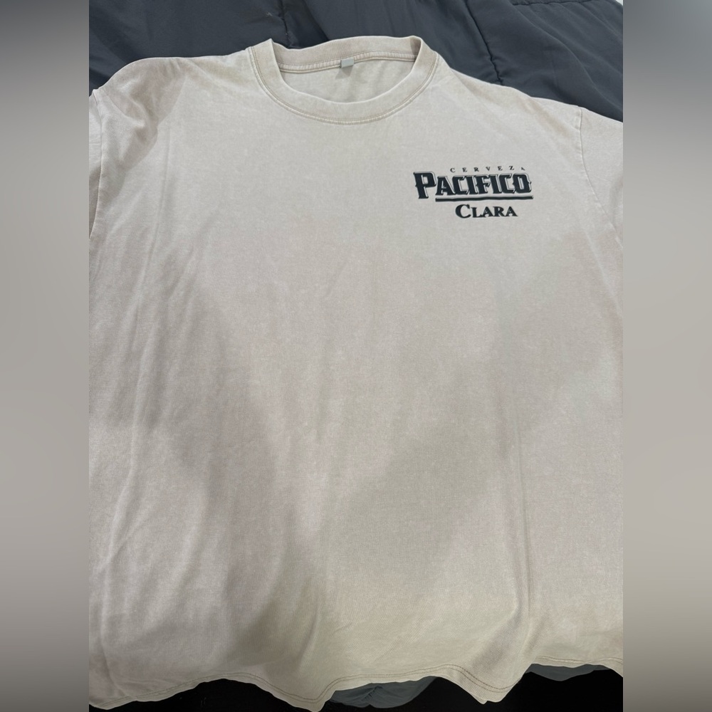 Pacifico shirt, worn and washed once (letters slightly peeled).